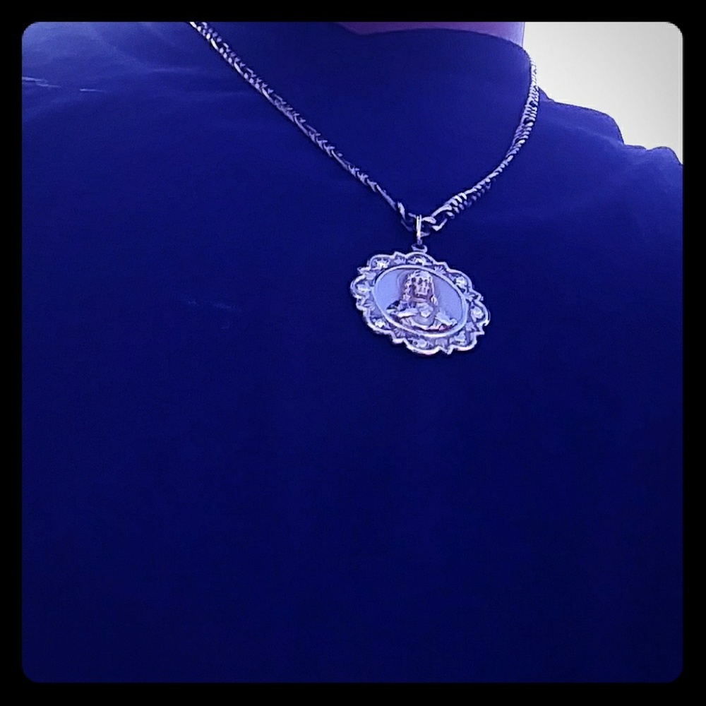 14-karat gold chain with 10 karat gold medallion